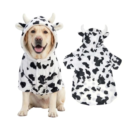 Dog in a black and white plush cow costume with dimensional horns and ears